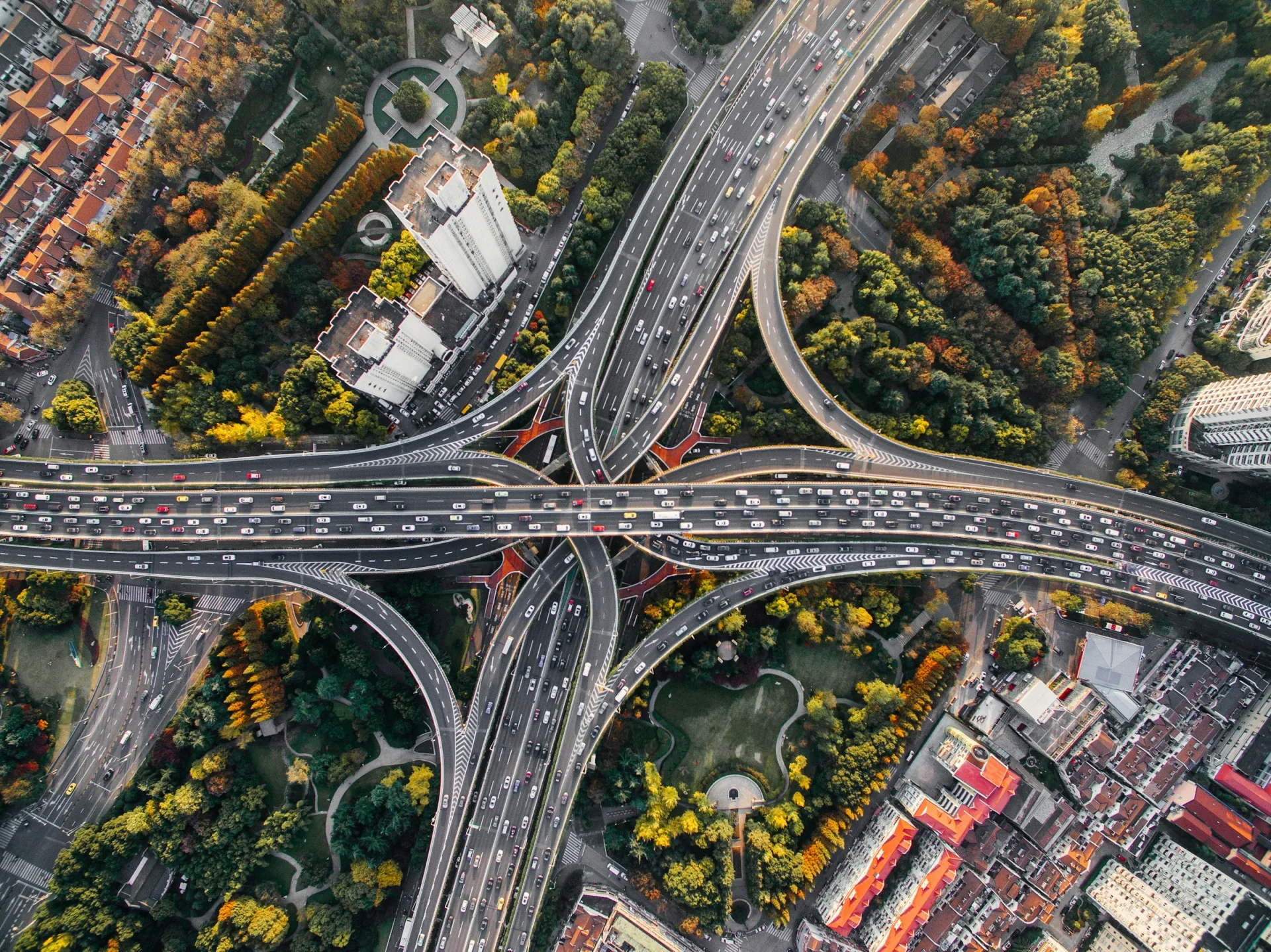 Aerial view of a multi-level highway interchange and civil infrastructure